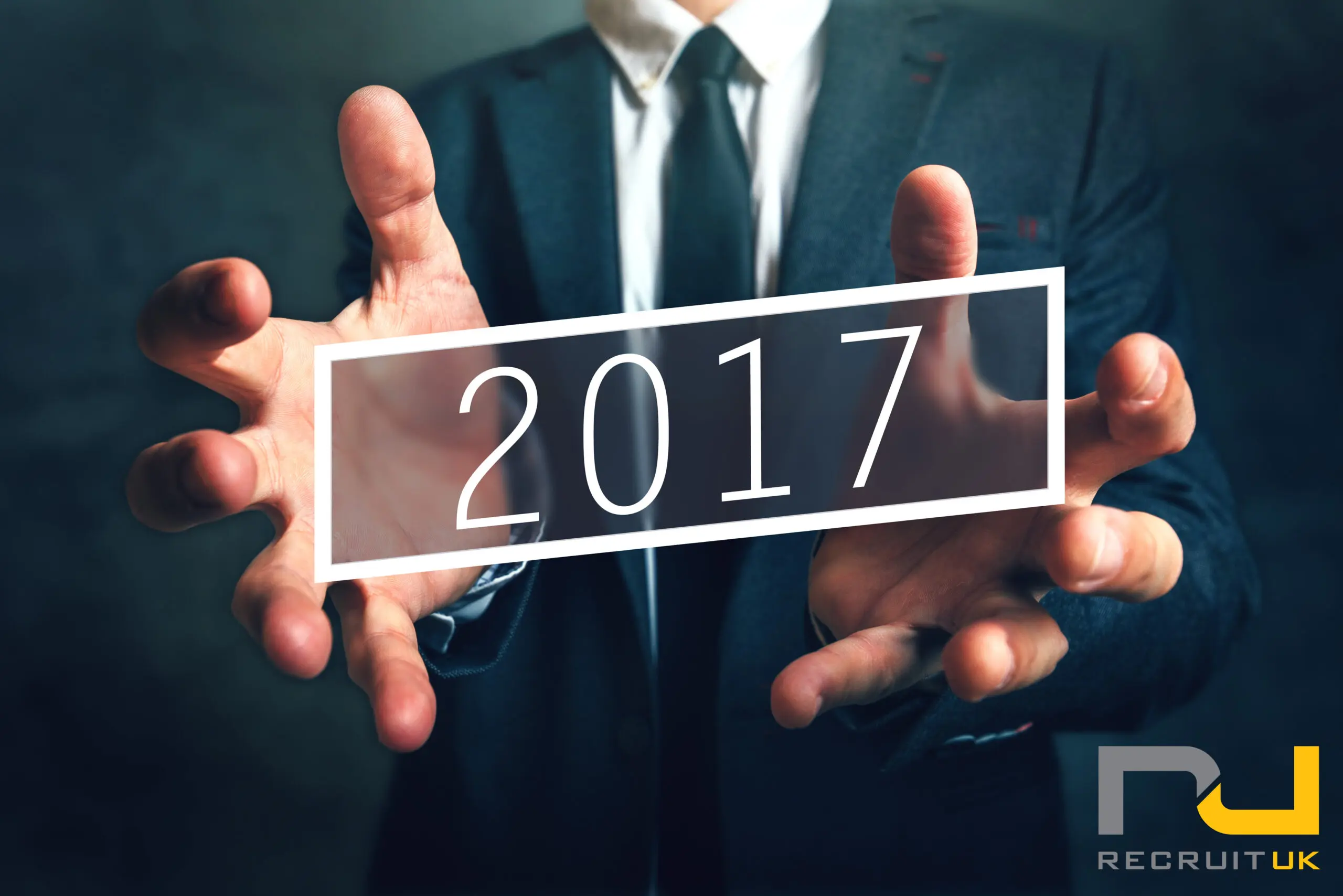 Man holding '2017'