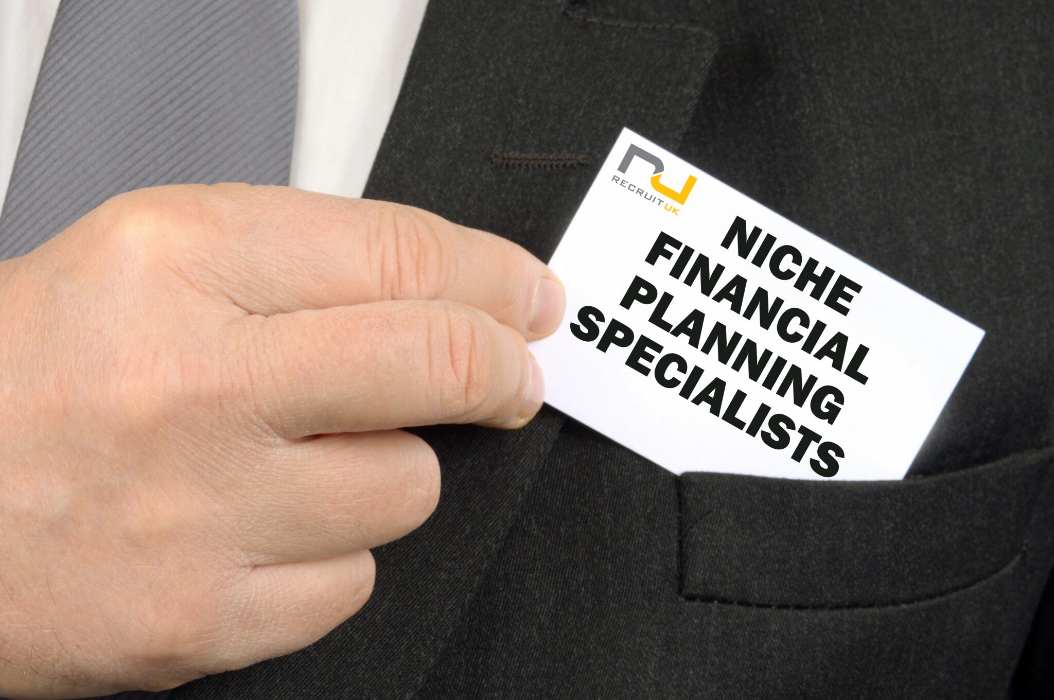 Man with 'Niche Financial Planning Specialists' business card in his jacket