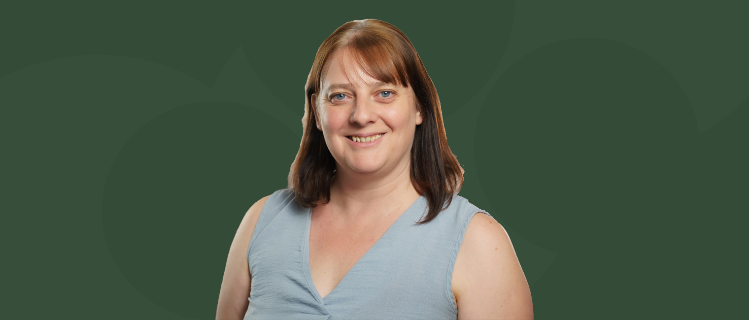 Portrait image of Lisa Tipton with a green background