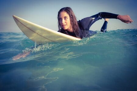 Female living the dream, surfing